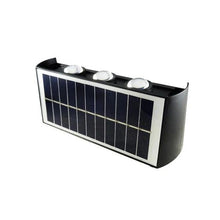 Cargar imagen en el visor de la galería, aplique bidireccional solar con 3 luces led calidas de 2w cada una sobre fondo blanco