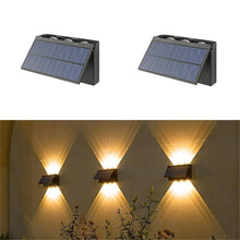Cargar imagen en el visor de la galería, Aplique bidireccional solar de pared LED exterior IP66 6 leds 840LM recargable con panel solar
