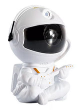 Cargar imagen en el visor de la galería, Veladora Proyector de Estrellas Astronauta con Control Remoto – Luz LED Giratoria 360°
