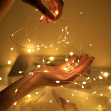 Cargar imagen en el visor de la galería, guia-luces-led-luciernaga-cálida-2m-pila-hilo-luz
